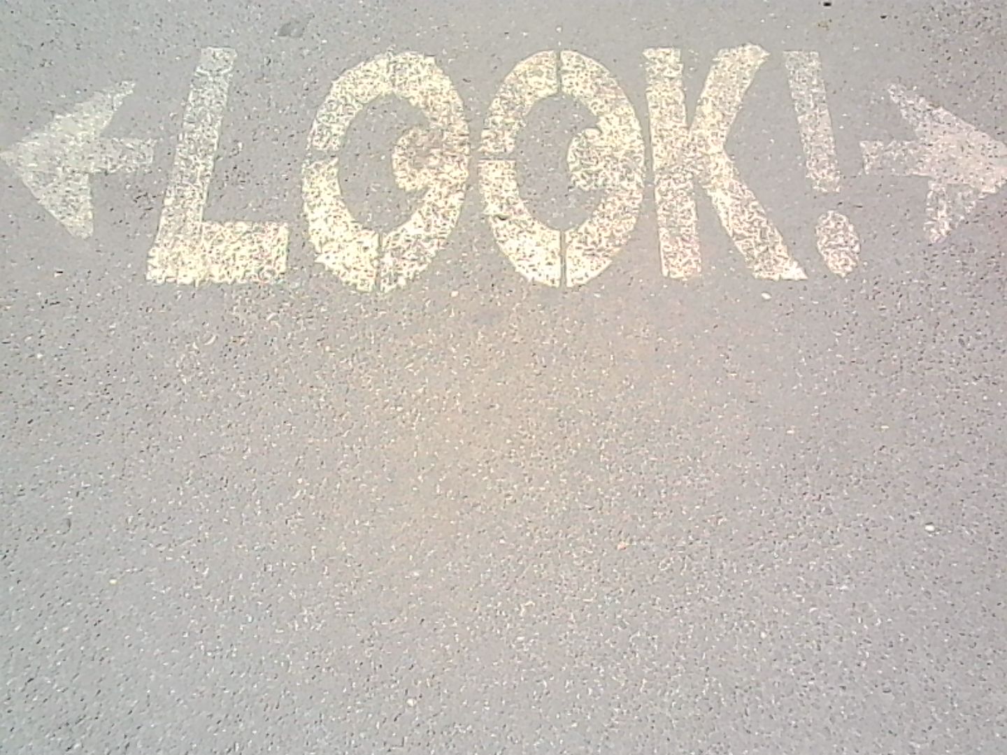 LOOK! stencilled on the pavement